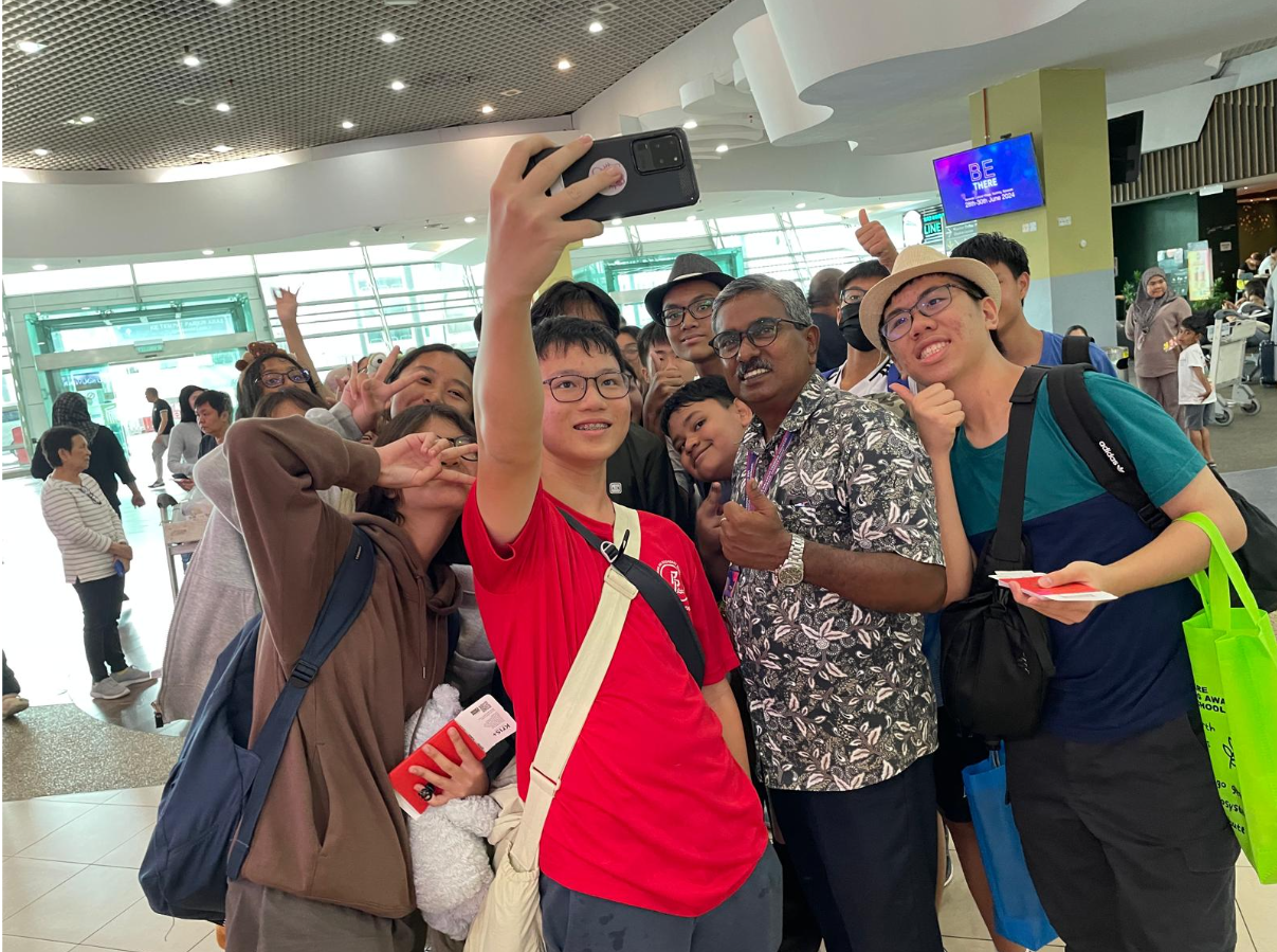 PRSS students taking a selfie with a local guide.